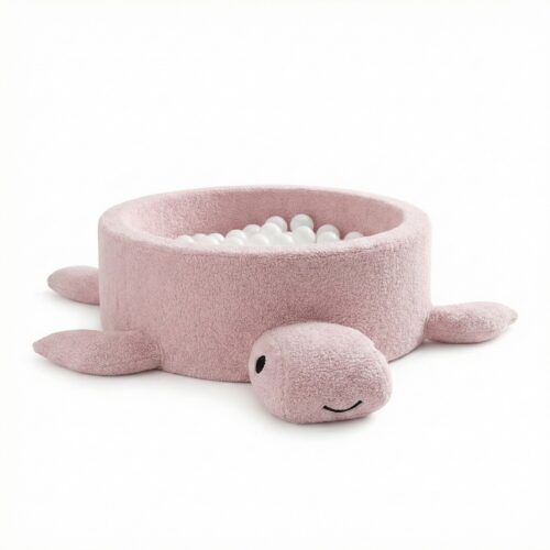 A foam ball pit for babies without balls—a turtle in raspberry-glazed pink bouclé